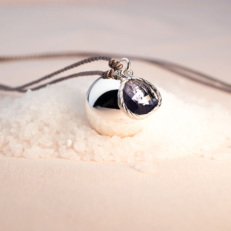 Bola Argenté pendentif