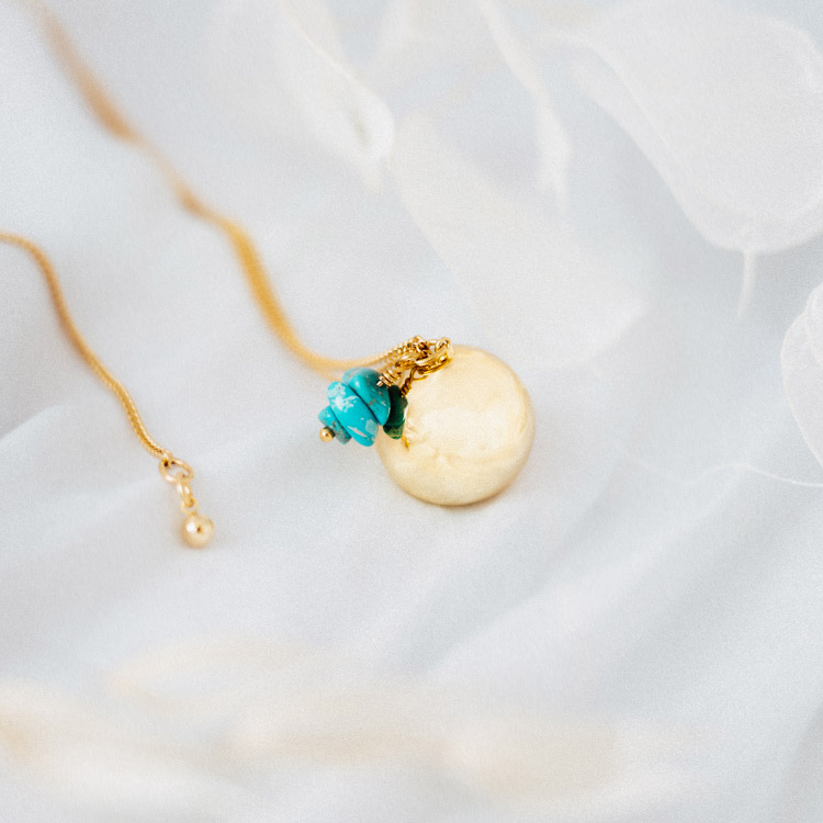 bola de grossesse or turquoise
