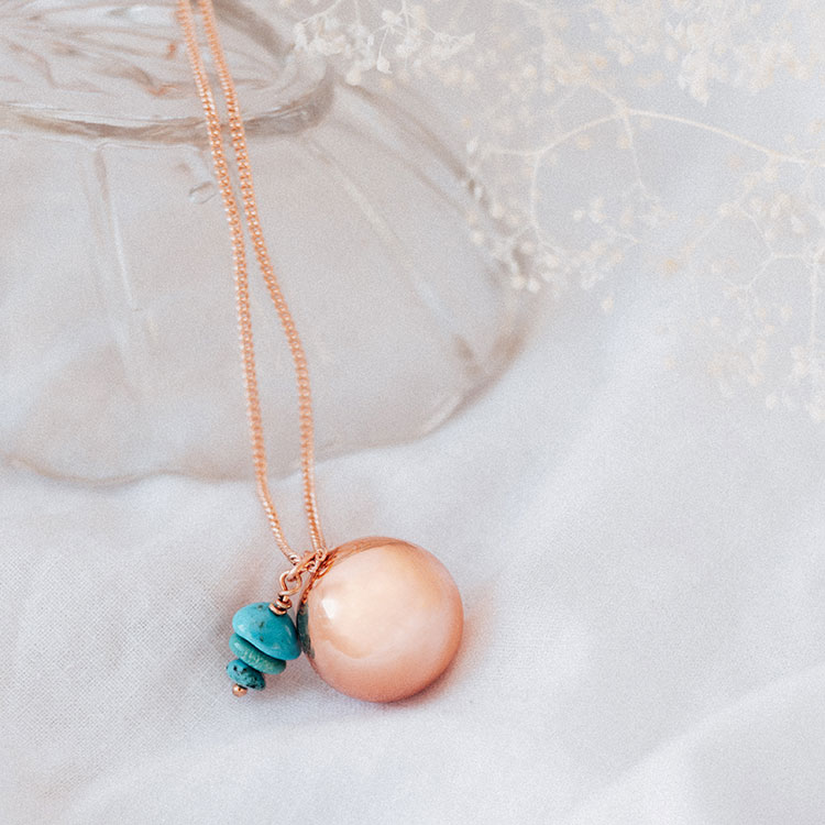 bola de grossesse avec pierre turquoise