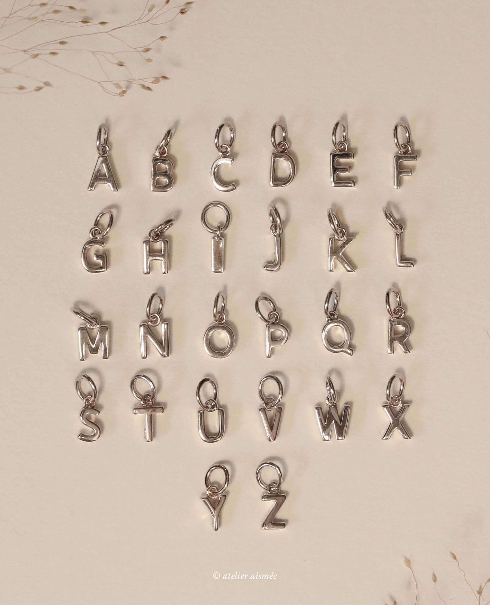 Collier initiale argent et pierre <i>améthyste cœu