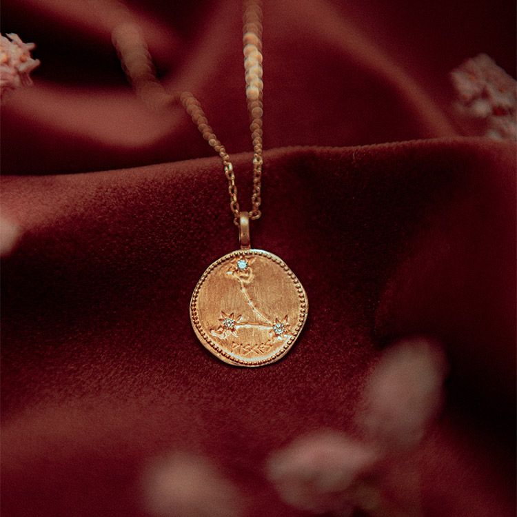 Collier astro Poissons