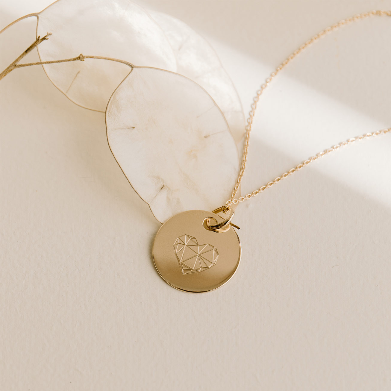 Collier coeur géométrique plaqué or
