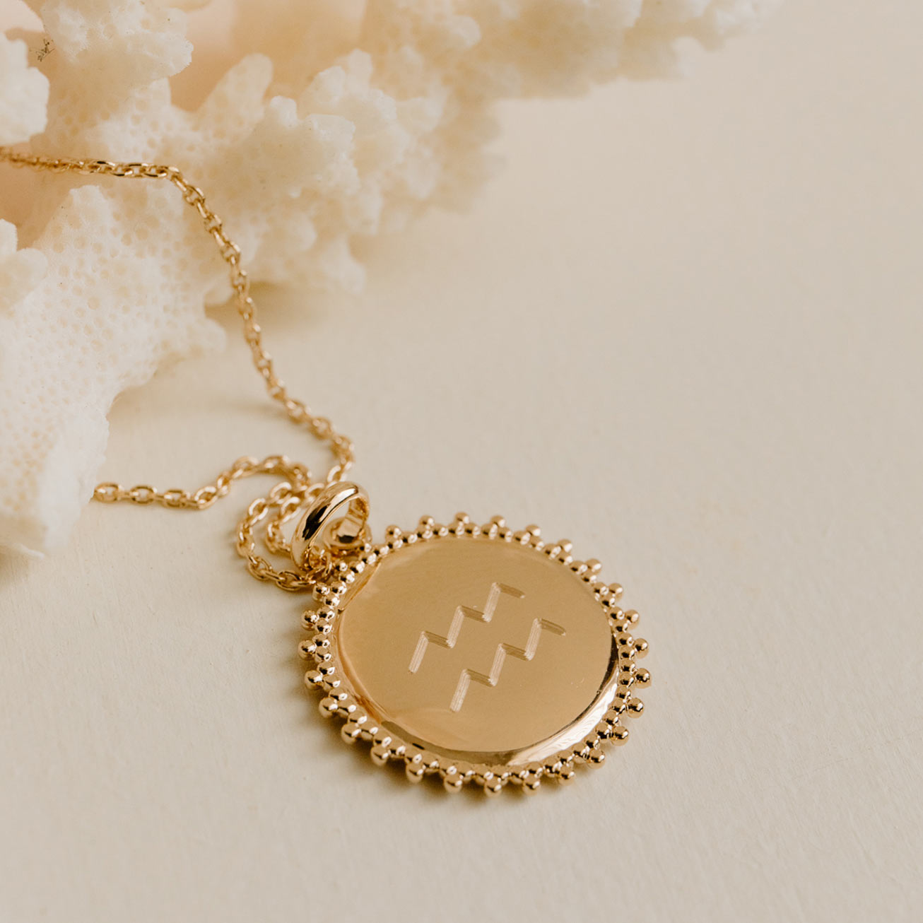 Collier astro soleil or
