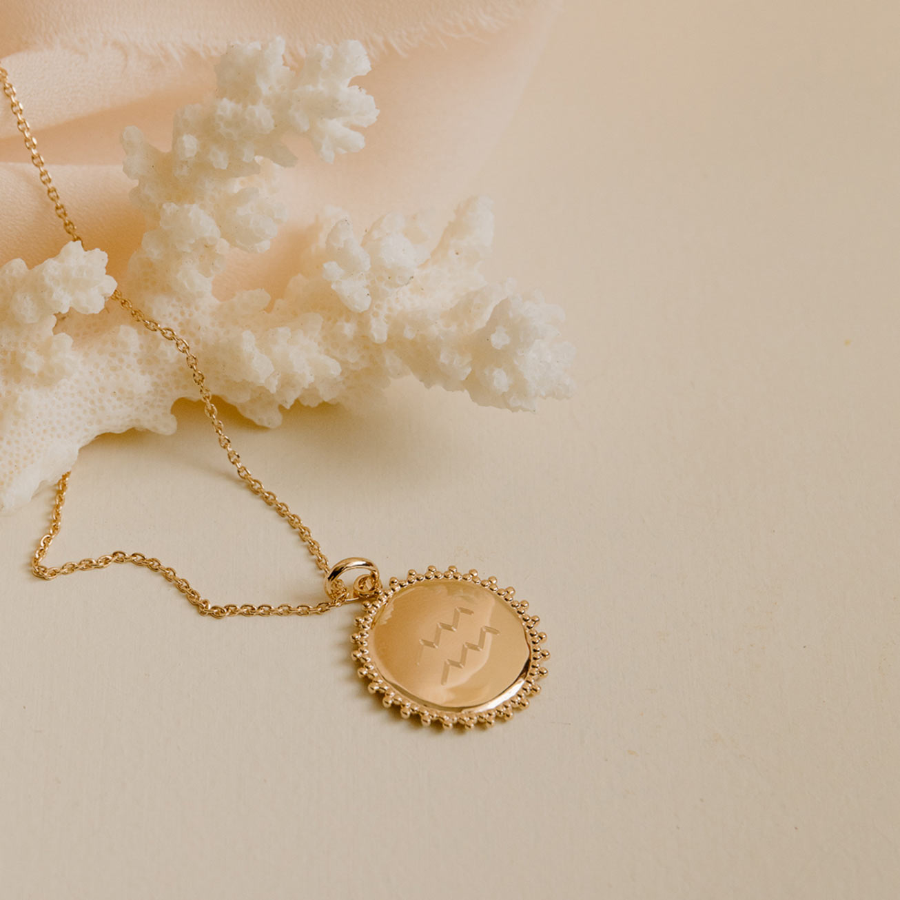 Collier astro soleil or
