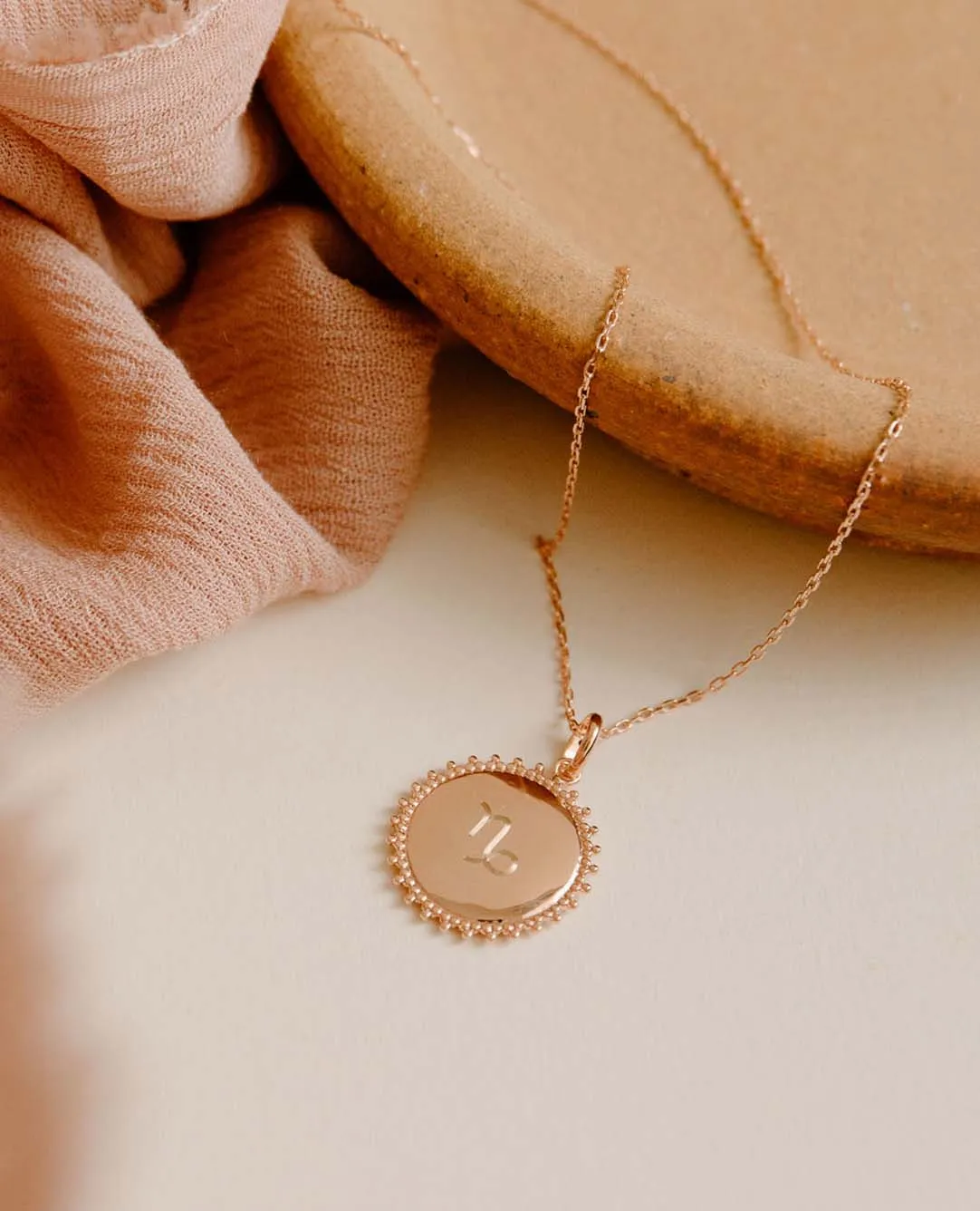 Collier astro Soleil plaqué or rose