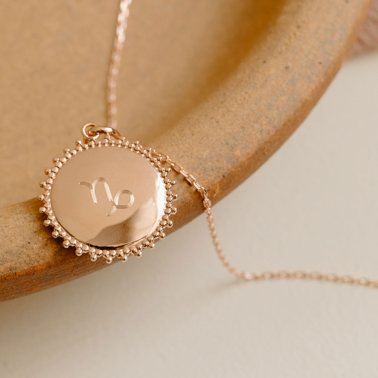 Collier astro Soleil plaqué or rose
