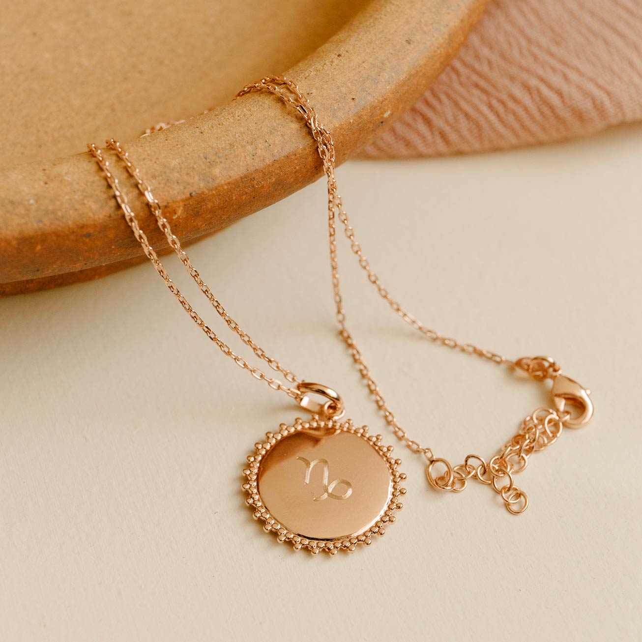Collier astro Soleil plaqué or rose