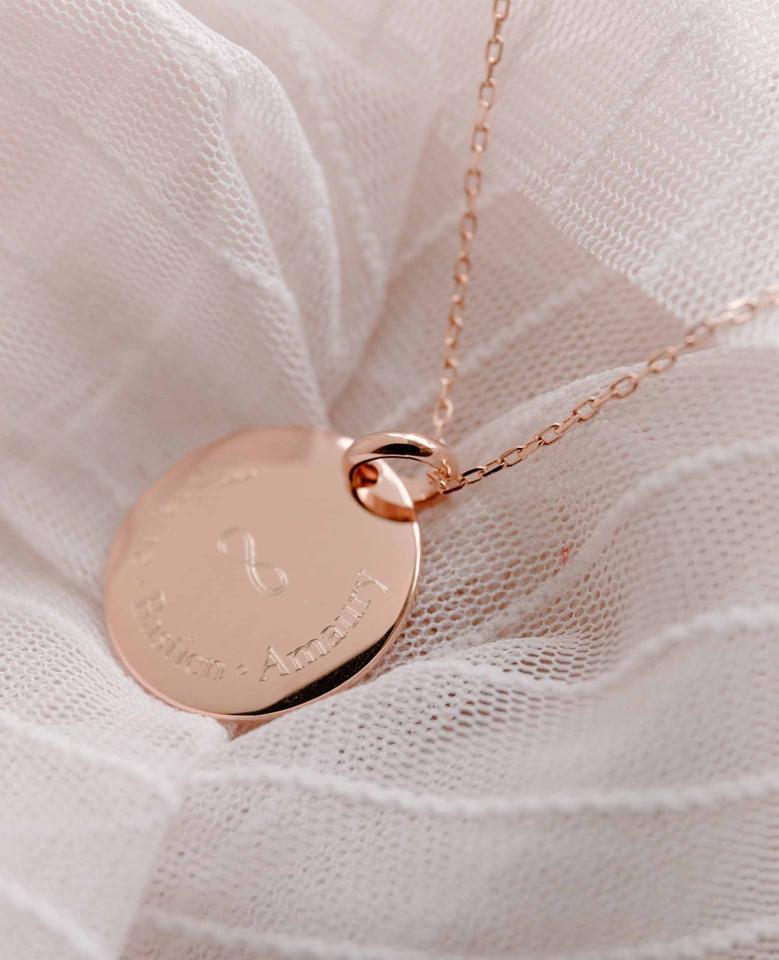 Médaille bombée infini plaqué or rose