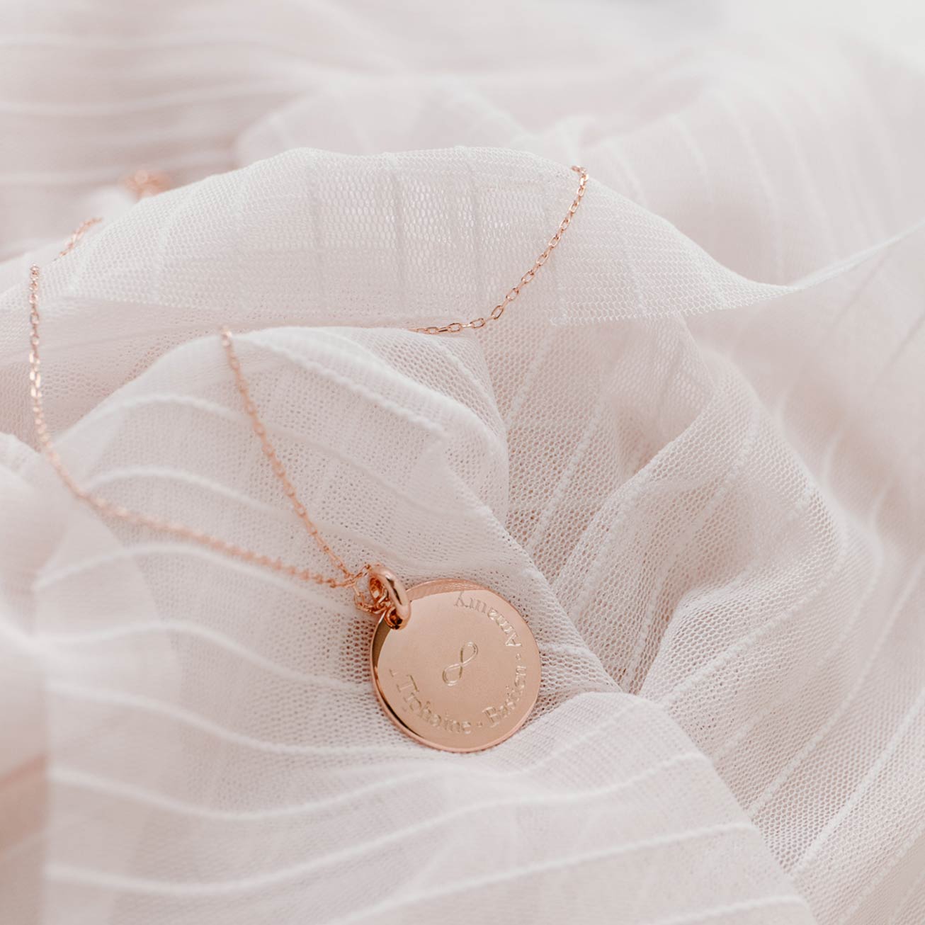 médaille bombée infini plaqué or rose